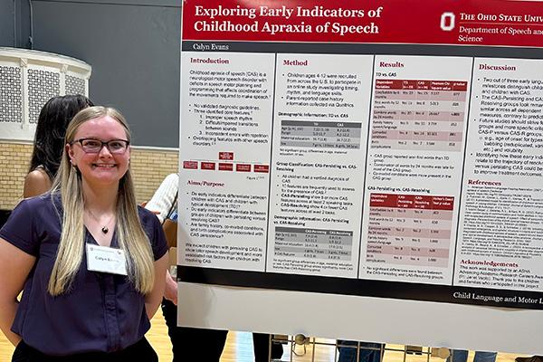 Calyn Evans with research poster